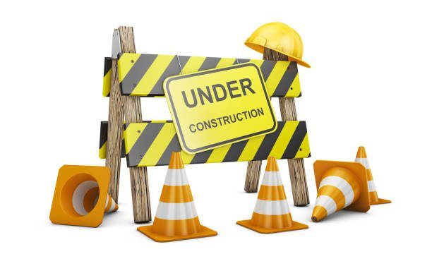 Road barrier with the words Under construction. 3d render.
